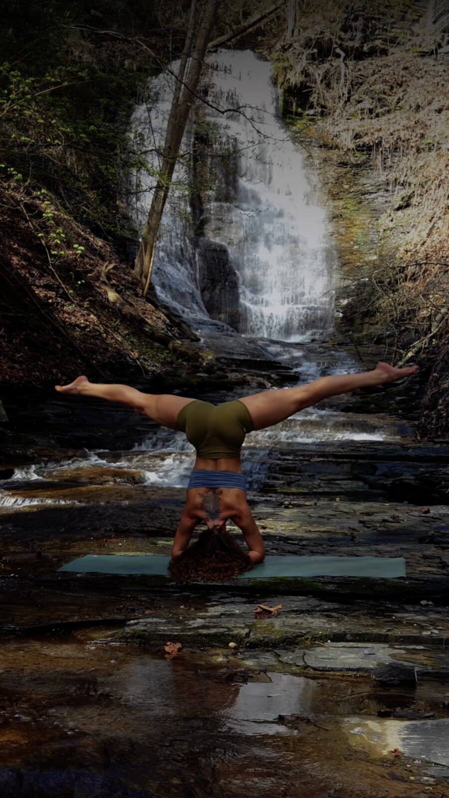 Mackenzie Homan practicing outdoor yoga in the forests and waterfalls of Ithaca NY 1